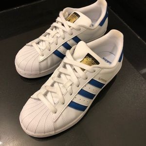 adidas superstars. white / royal blue / women’s 5